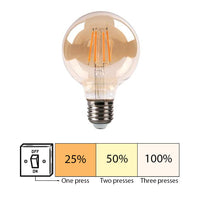 LED filamentlamp met amberkleurig glas in vooraanzicht, voorzien van E27 fitting en drie-staps dimfunctie via wandschakelaar (25%, 50%, 100%).
