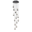 Close-up vooraanzicht van een moderne hanglamp met meerdere glazen druppelvormige lichtpunten, bevestigd aan een ronde zwarte plafondplaat - ideaal als eyecatcher voor hoge plafonds of trappenhuizen.