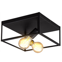 Industriële zwarte plafondlamp met open vierkant metalen frame en zichtbare filamentlampen, schuin van onderen gefotografeerd.