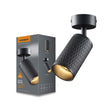 Zwarte Videx GU10 Spotlight met diamantpatroon, moderne plafondspot in schuine vooraanzicht, afgebeeld naast productverpakking.