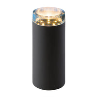Cilindervormige zwarte LED-buitenlamp met glazen bovenkant en warm wit licht, vooraanzicht.